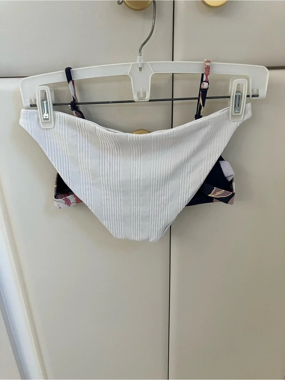 Bikini:  Floral Print Navy Bralette Top with white bottoms